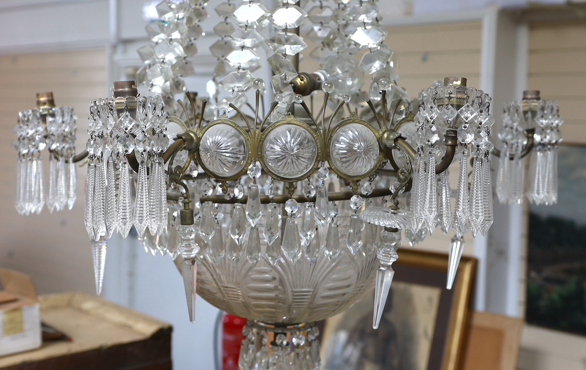 An Edwardian cut glass chandelier, drop 140cm diameter 70cm